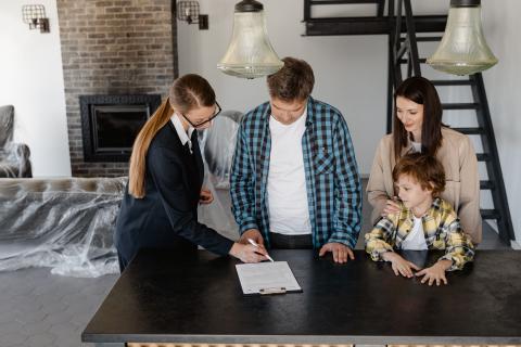 Real estate agent going over documents