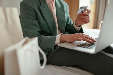 Person purchasing item using credit card