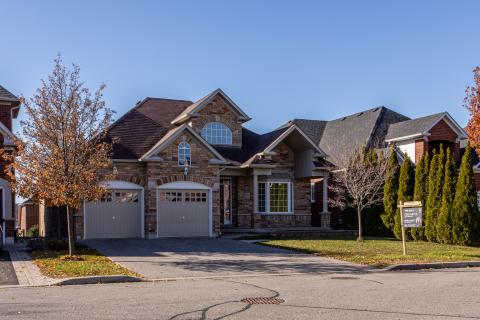 House with for sale sign